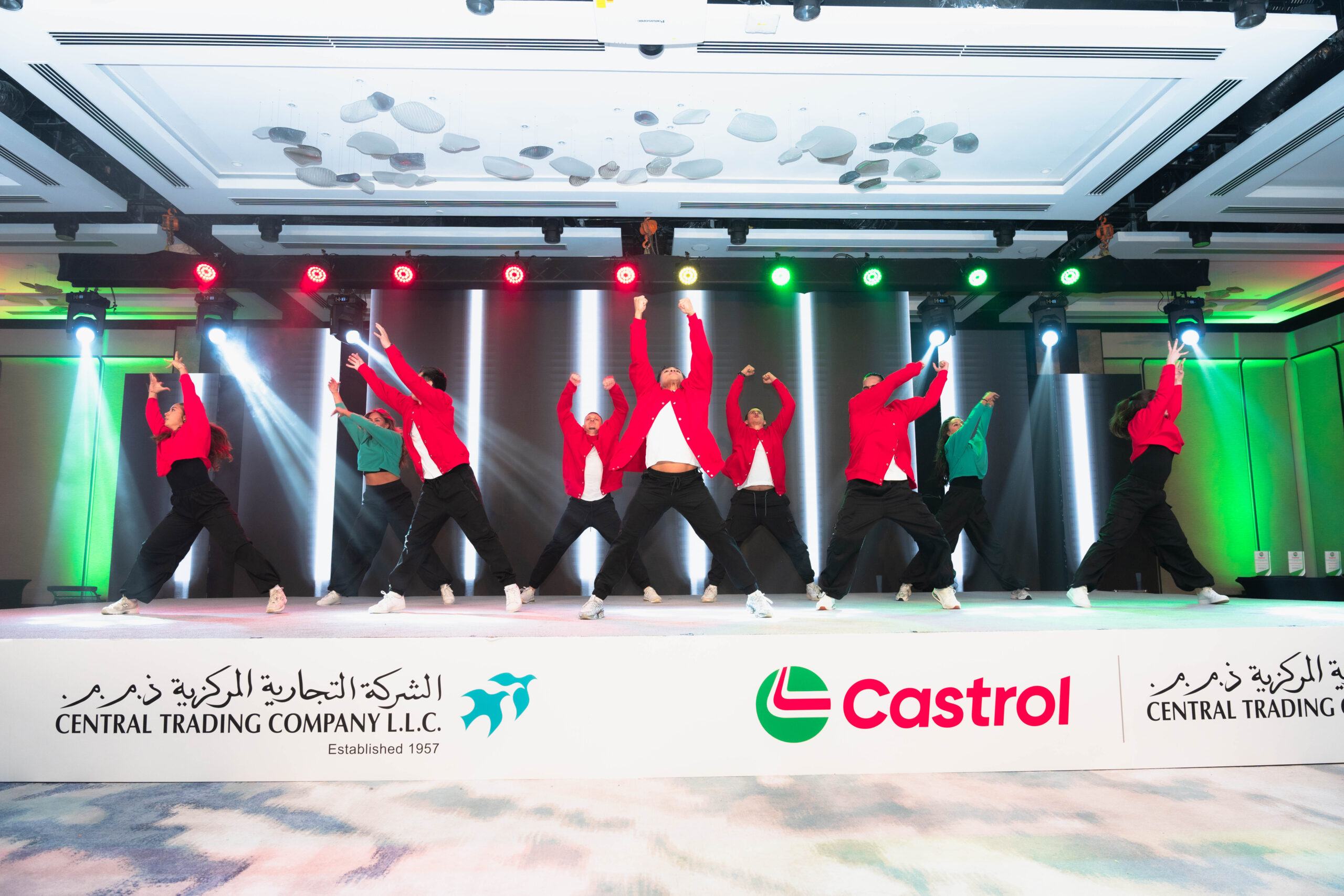 Dance Group Performing On Stage - Central Trading Company LLC