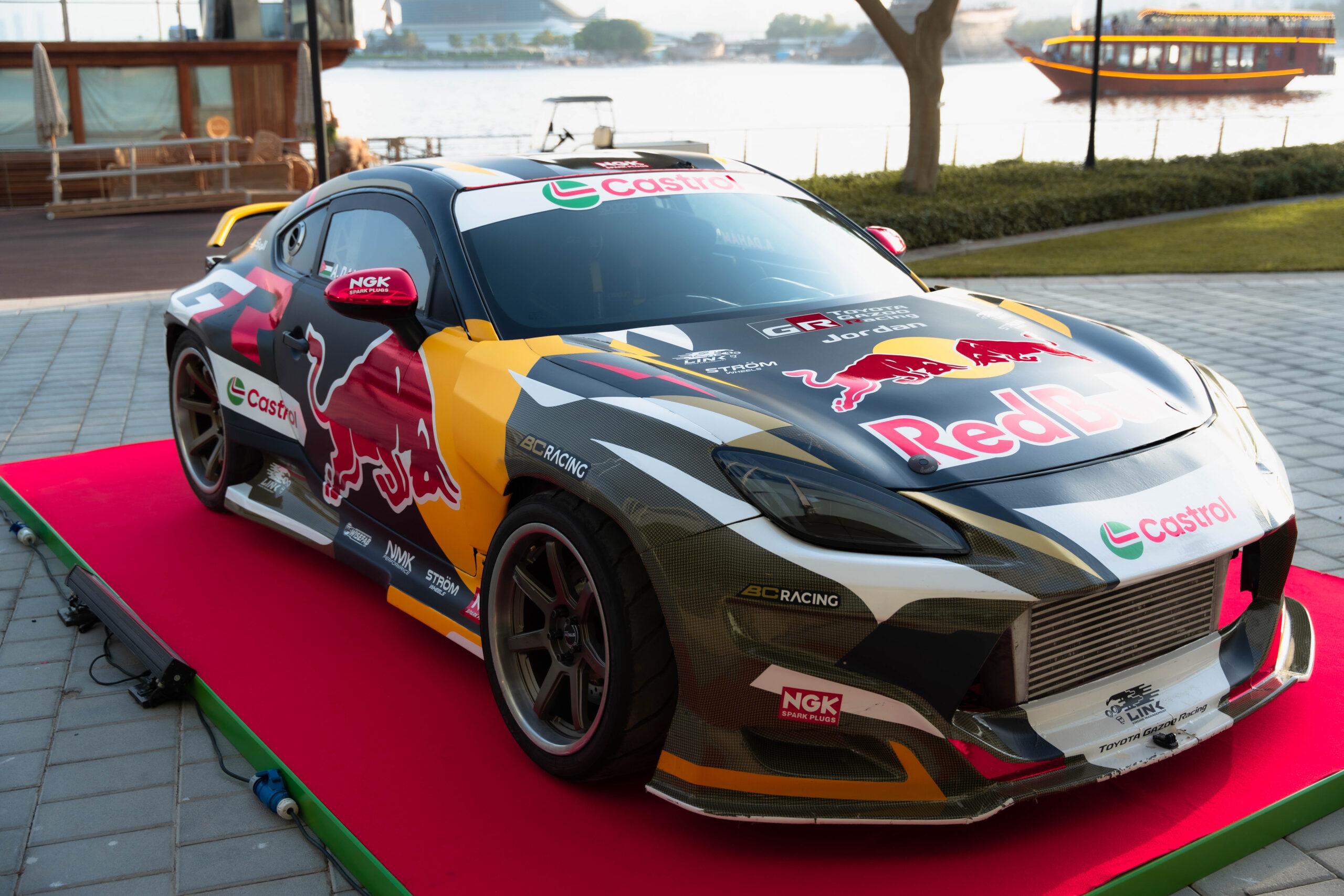 Red Bull Castrol Racing Car On Display - Central Trading Company LLC